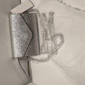 NWT Rosie Harlow silver glitter Xbody/wristlet/clutch purse. Dressy night out.